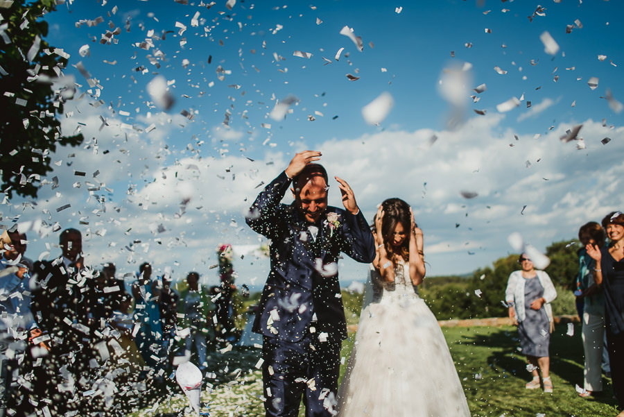 italian style outdoor wedding ceremony, confetti throwing, rice