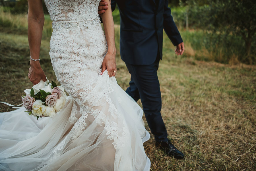 italian style outdoor wedding ceremony, bridal couple love lsess