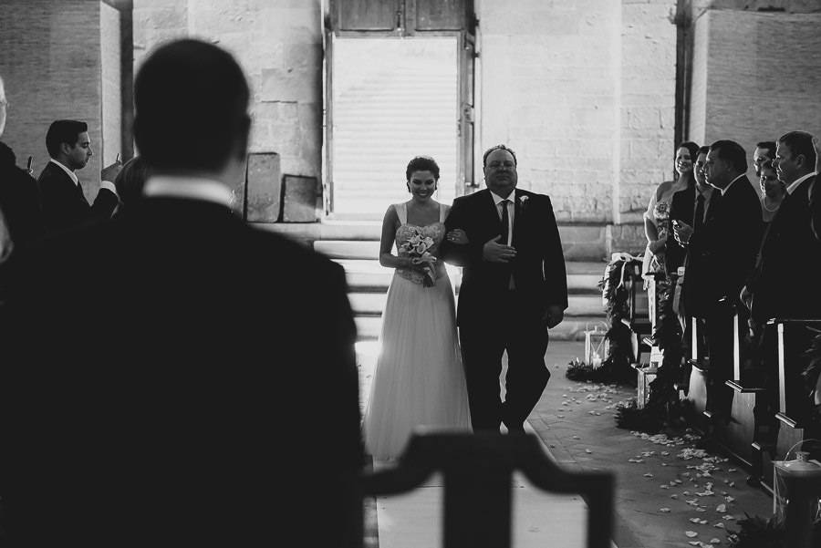 tuscany intimate wedding bride arrival in church with father