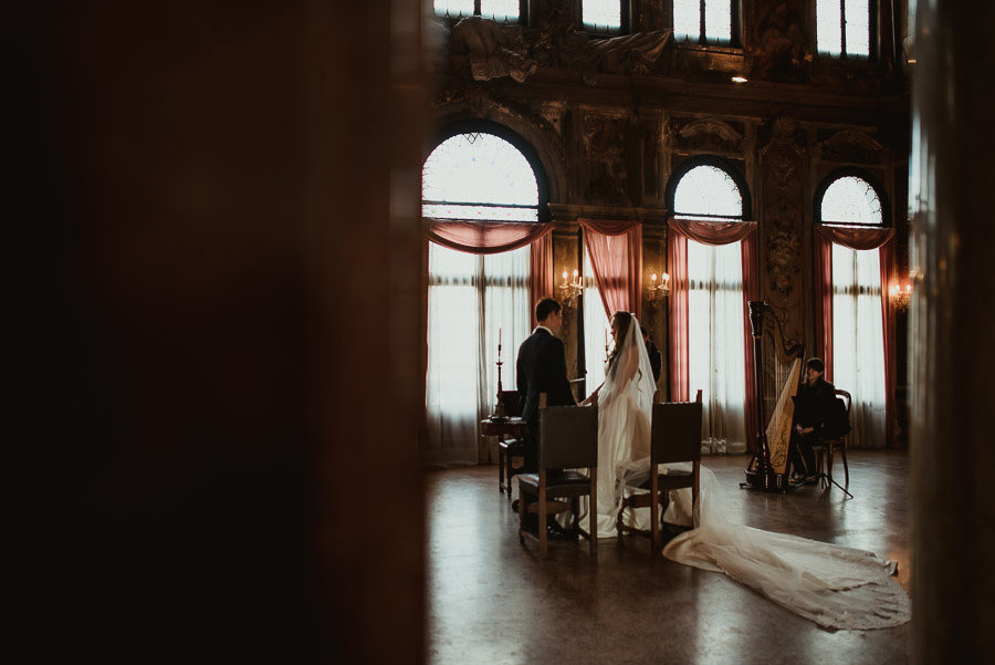 034 winter wedding in venice photography palazzo zenobio mirror hall ceremony Wedding Photographer Venice