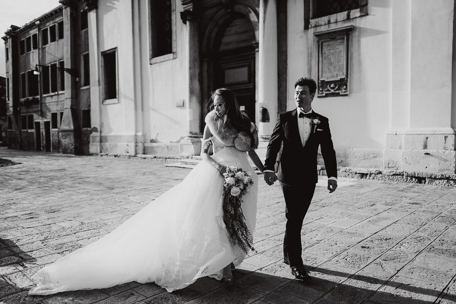 063 winter wedding in venice photography bride groom walking Wedding Photographer Venice