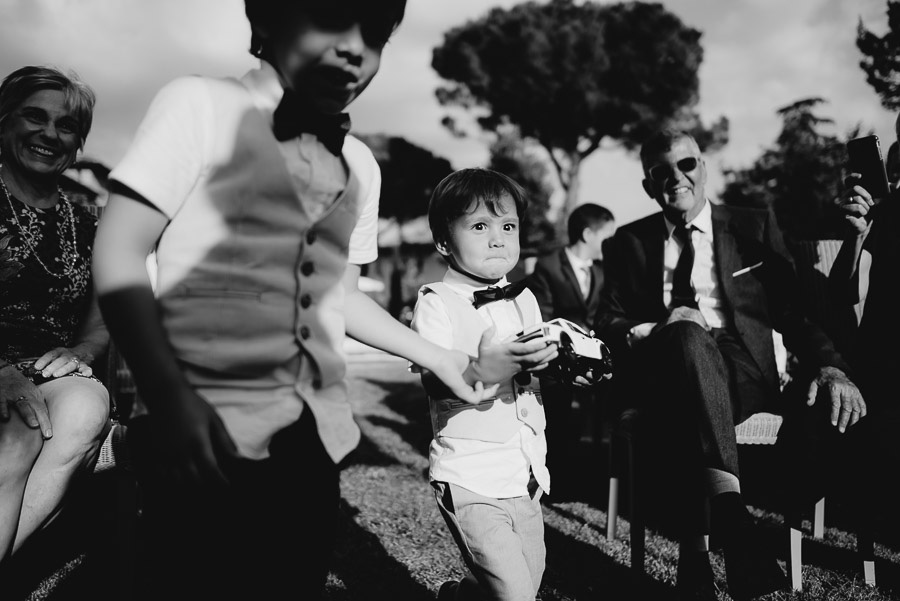 relaxed wedding in Tuscan Villa wedding ceremony kids bring rin