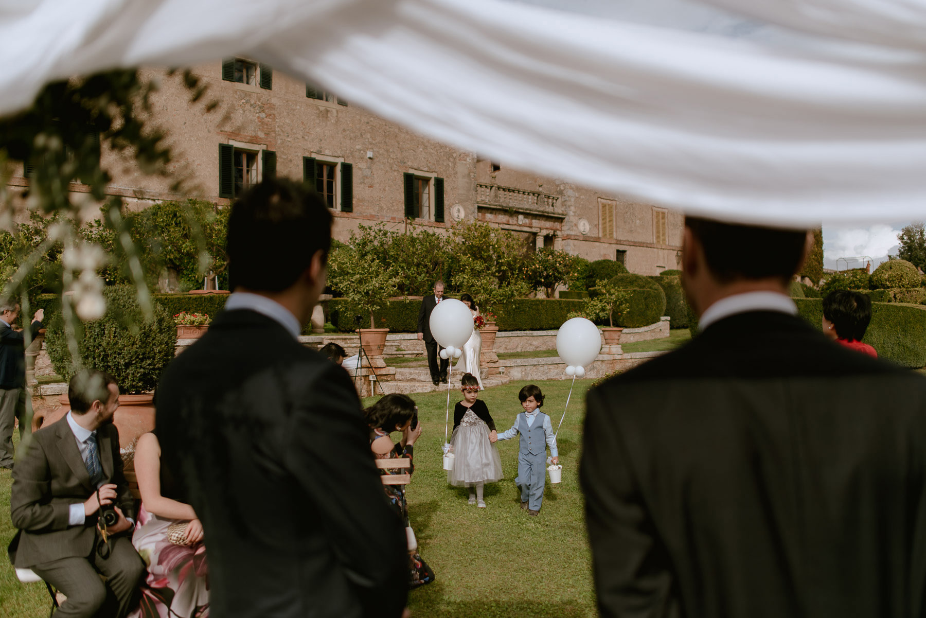 intimate wedding in Tuscany Italy Borgo Stomennano outdoor bride