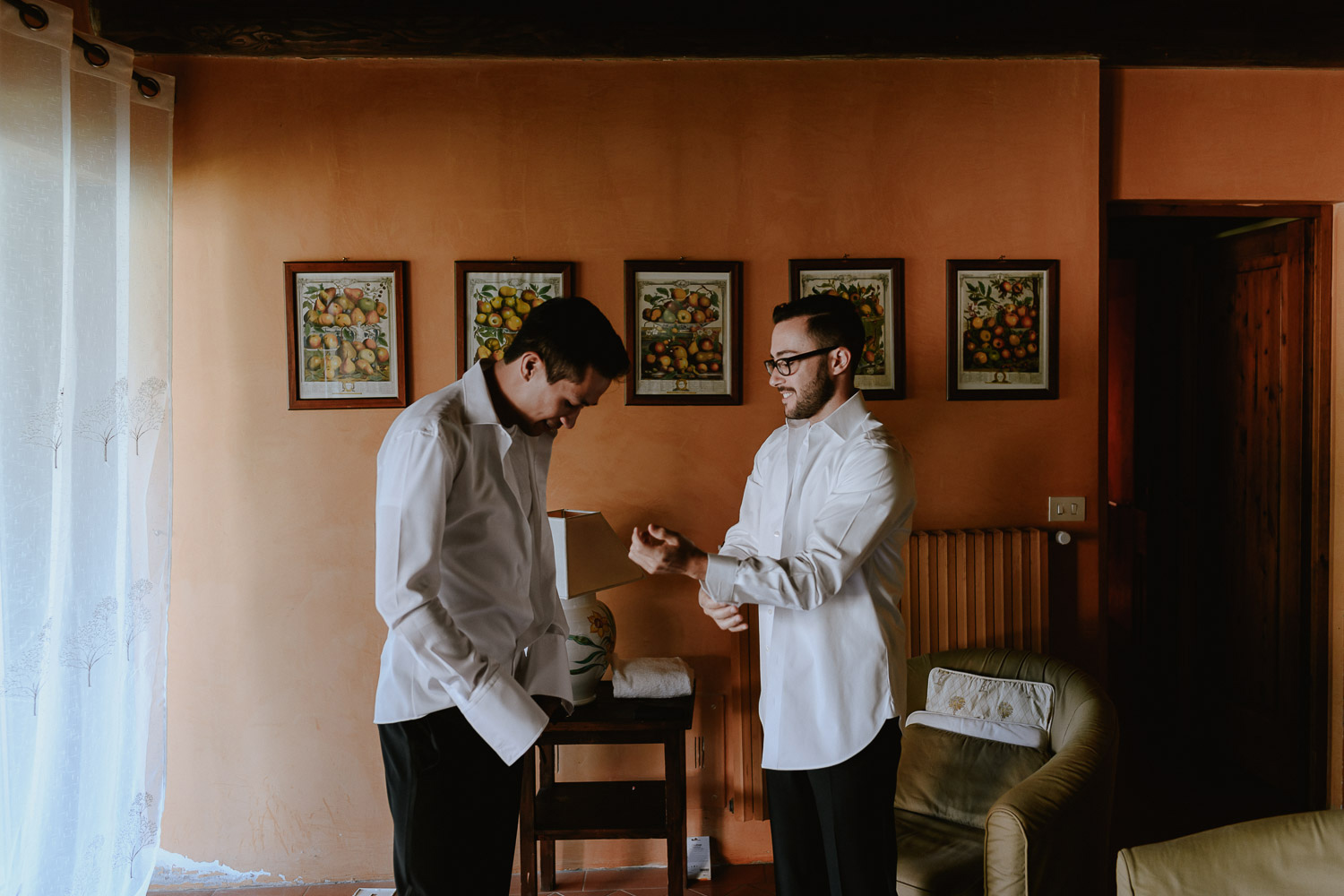 same sex wedding photographer florence two grooms getting ready