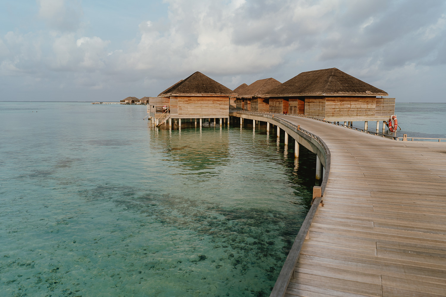 village maldives pier
