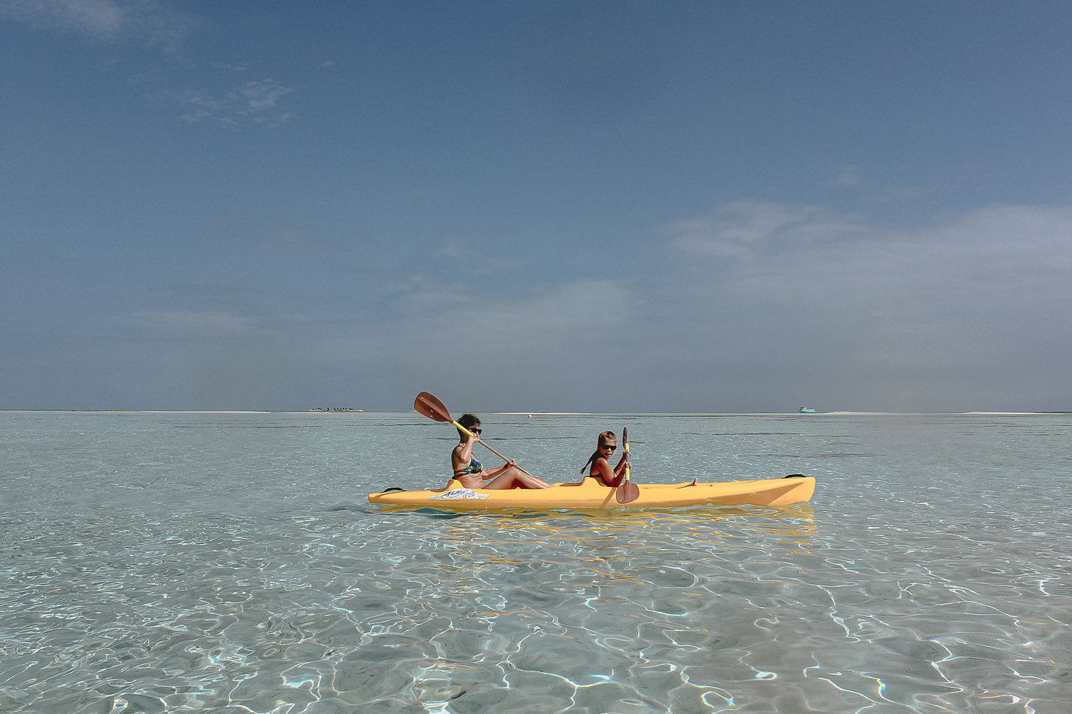 wedding photographer in maldives anniversary trip private sandbank affairs canoe dugout