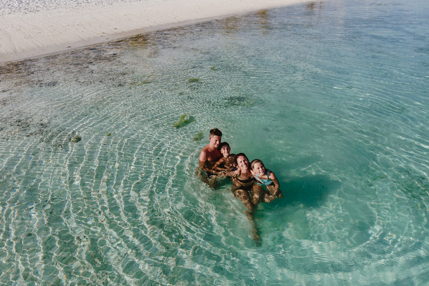 wedding photographer in maldives anniversary trip cocoon private beach sea family fun