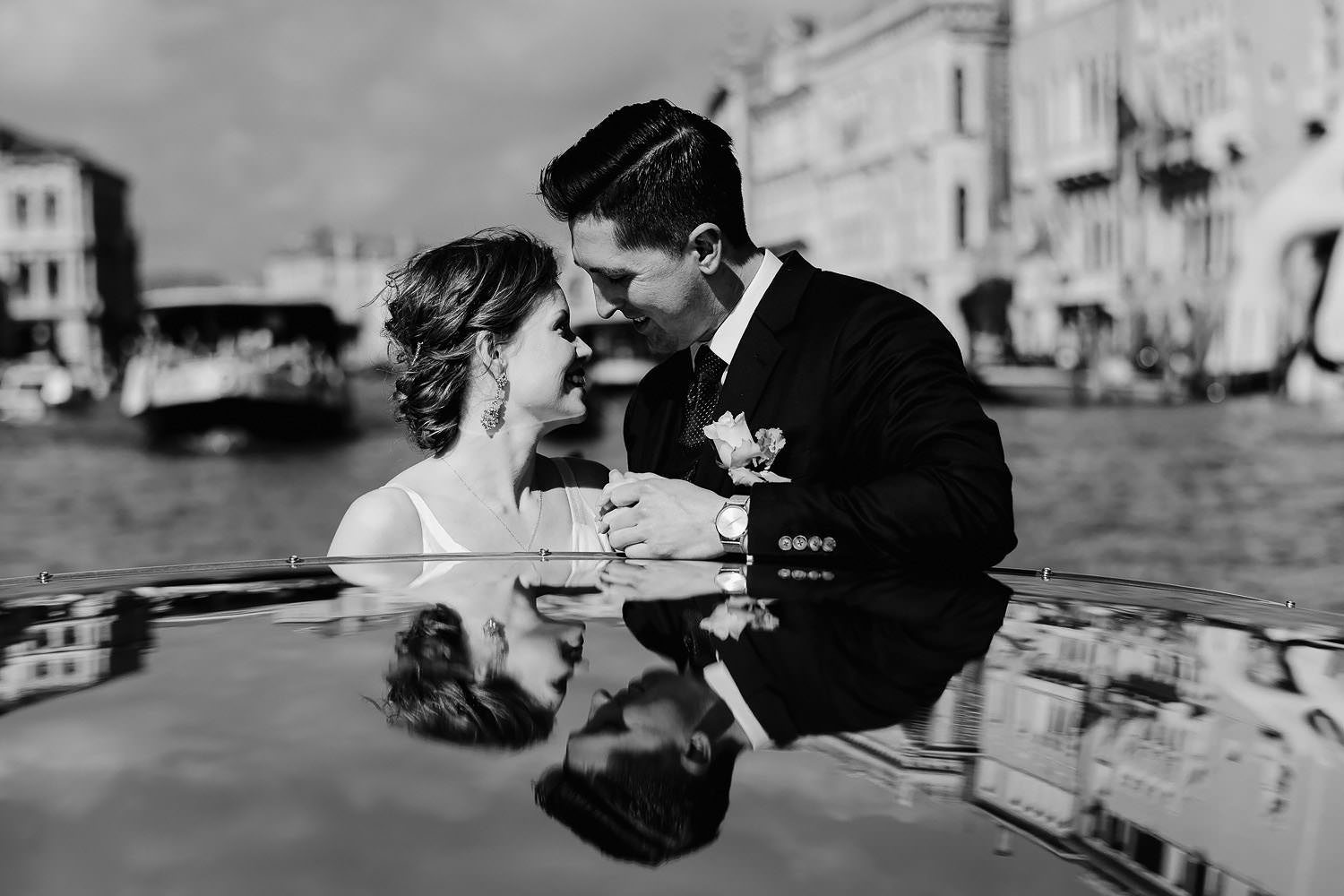 wedding photographer venice elopement photography bride water taxi ride