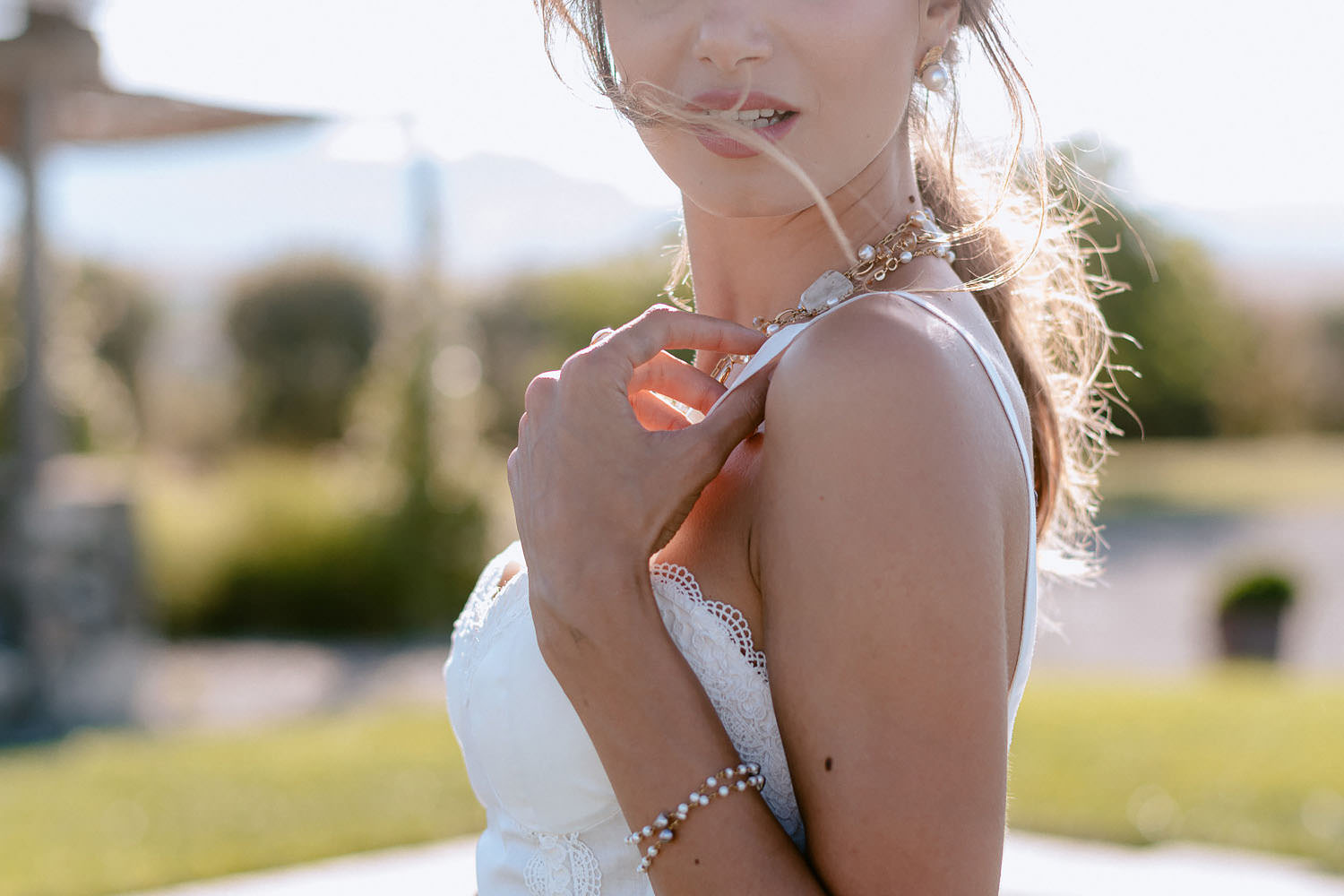 Wedding Inspiration Tuscan Rolling Hills bride in andreia cruz dress and oro due on pool