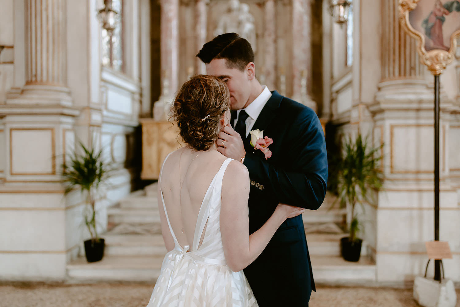 wedding photographer venice elopement symbolic intimate ceremony first kiss