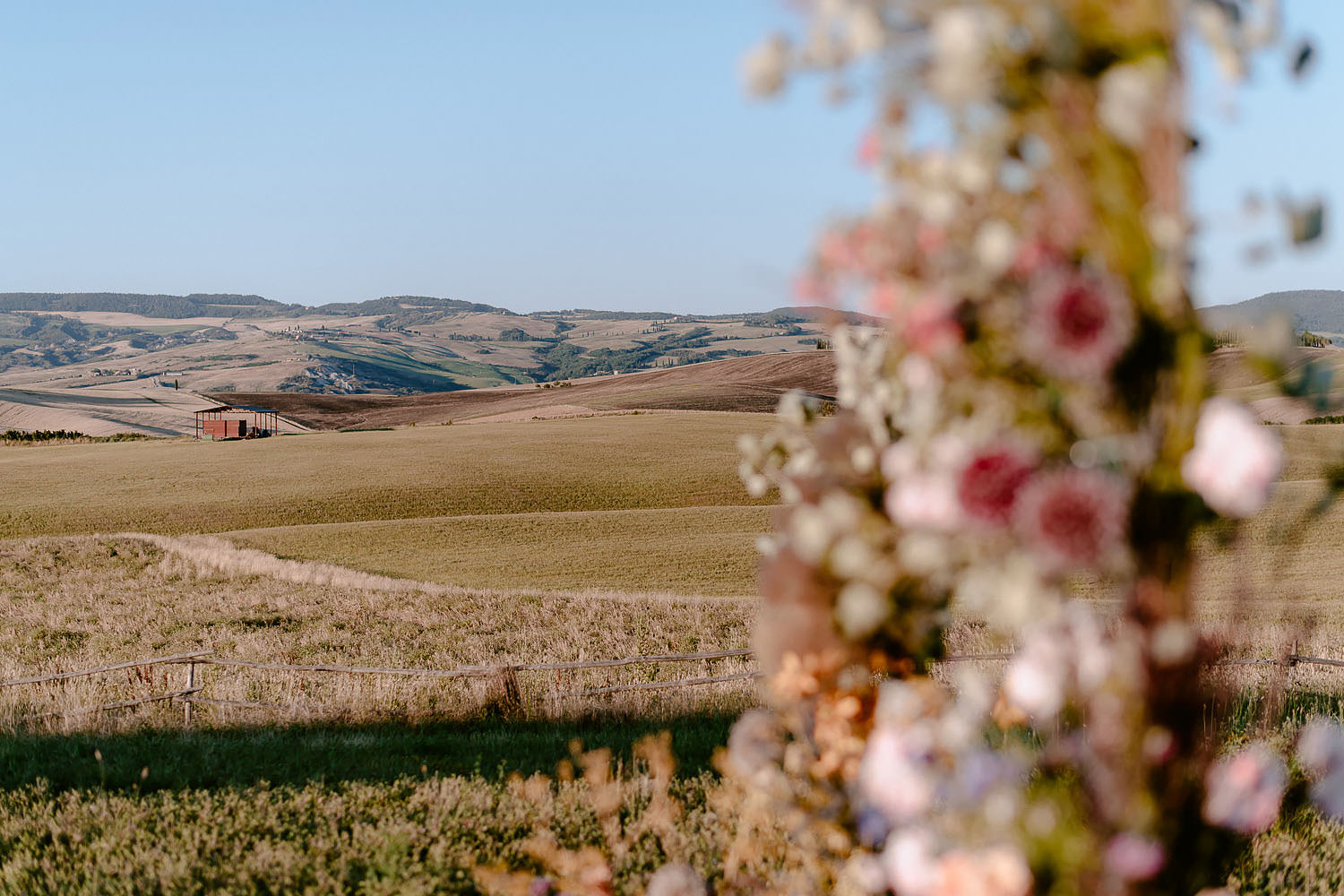 editorial intimate Wedding Inspiration in Tuscan Rolling Hills val d orcia rolling hills view by wedding ceremony spot