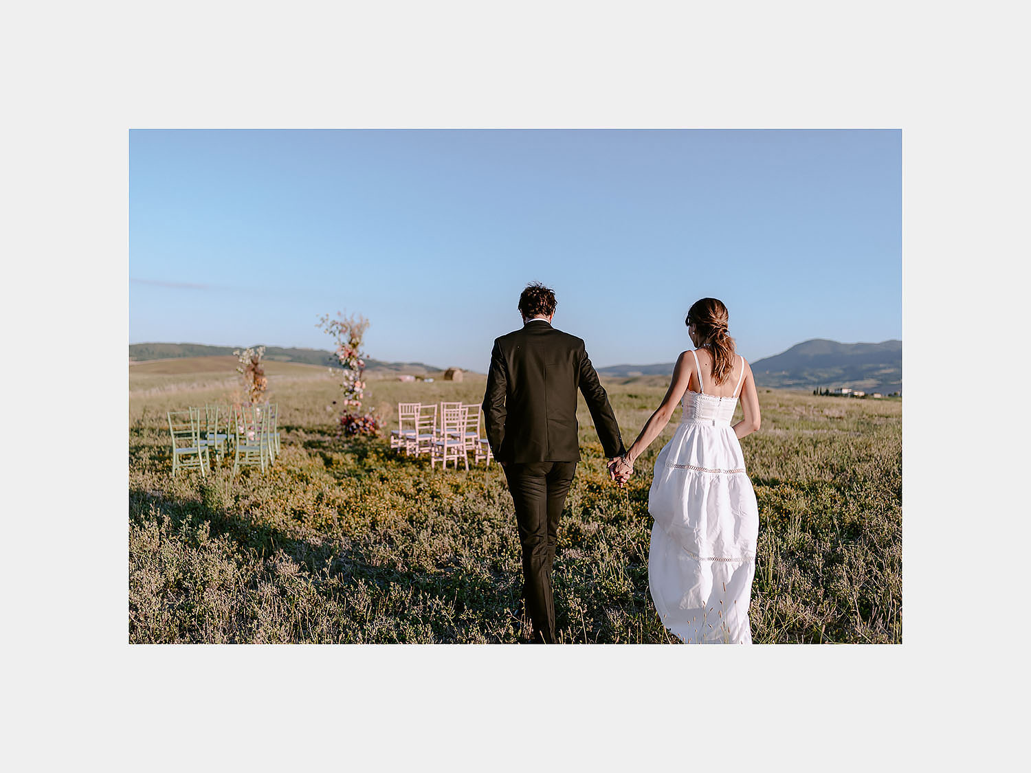 editorial Wedding Inspiration Tuscan Rolling Hills view by wedding ceremony spot