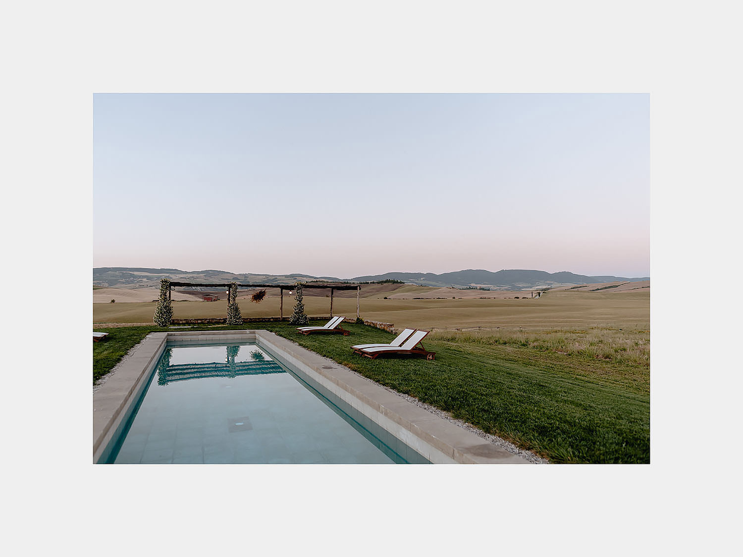 intimate Wedding Inspiration Tuscan Rolling Hills val d orcia locanda in tuscany at sunset pool
