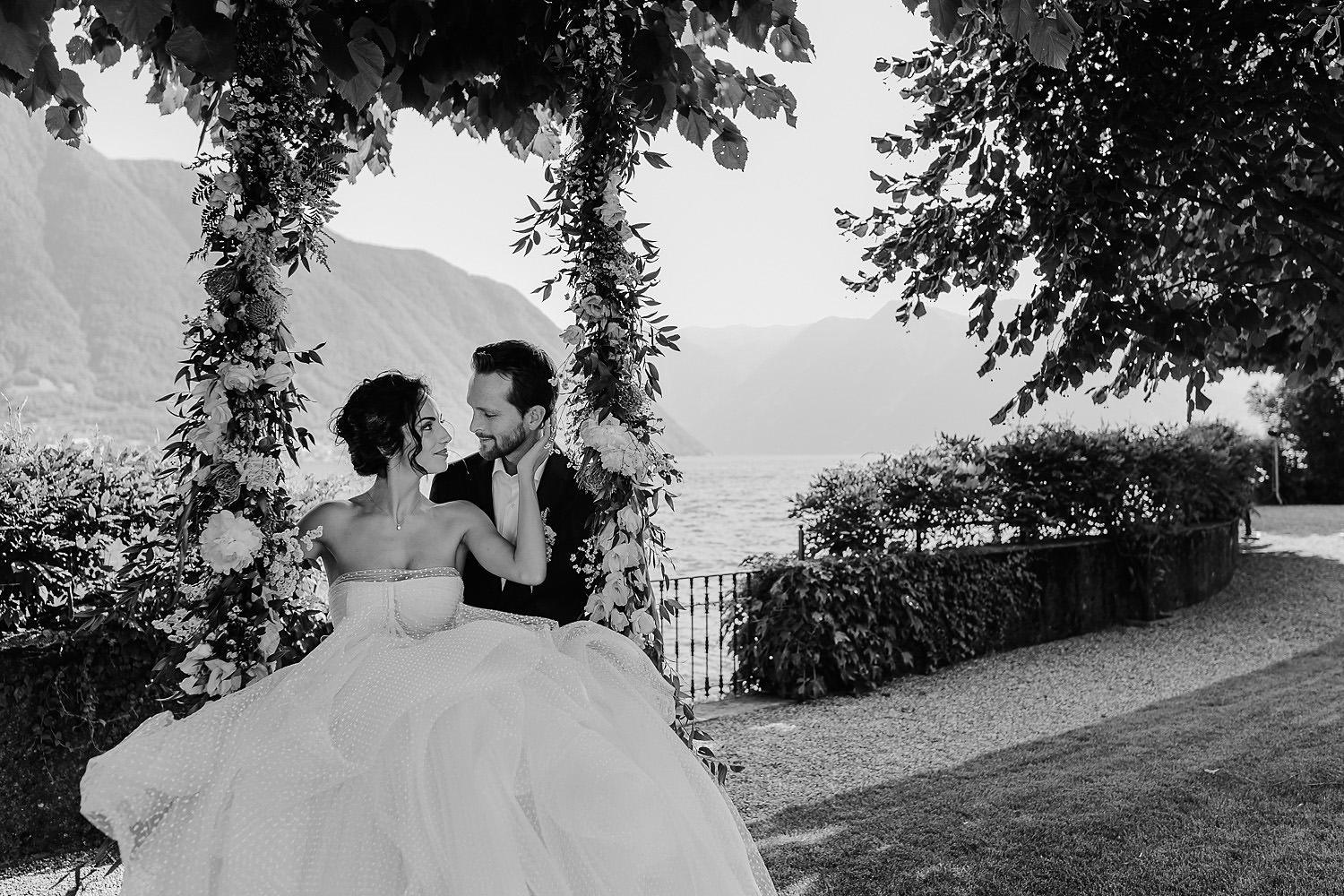 villa balbiano wedding photographer lake como bride groom flower swing first look