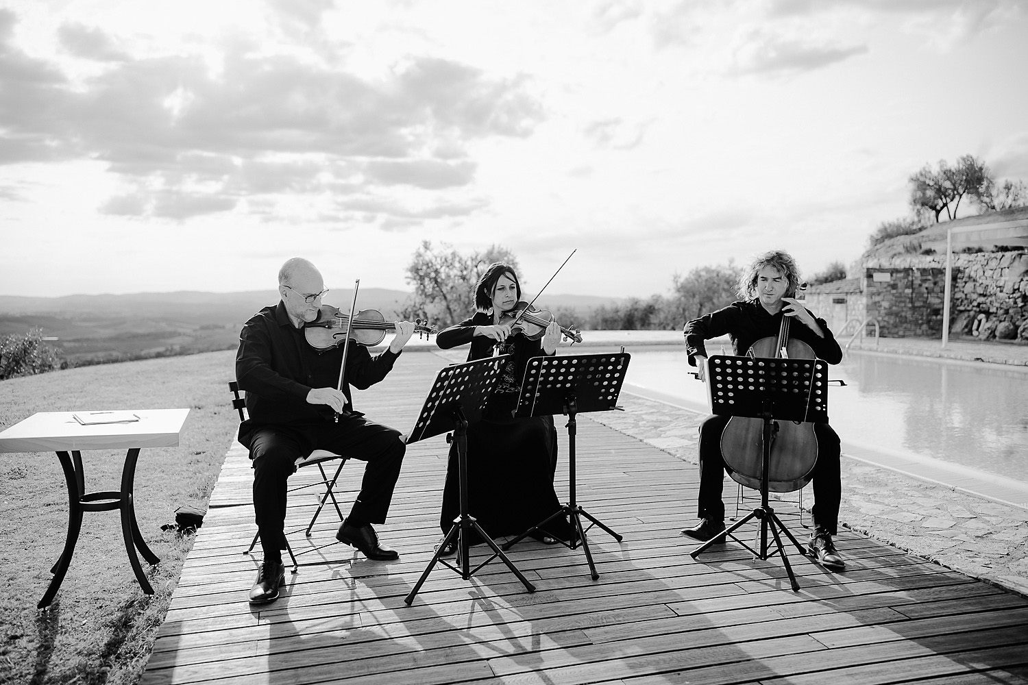 intimate micro wedding in tuscany rustic outdoor ceremony string trio
